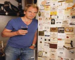 Julian Sands consuming alcohol